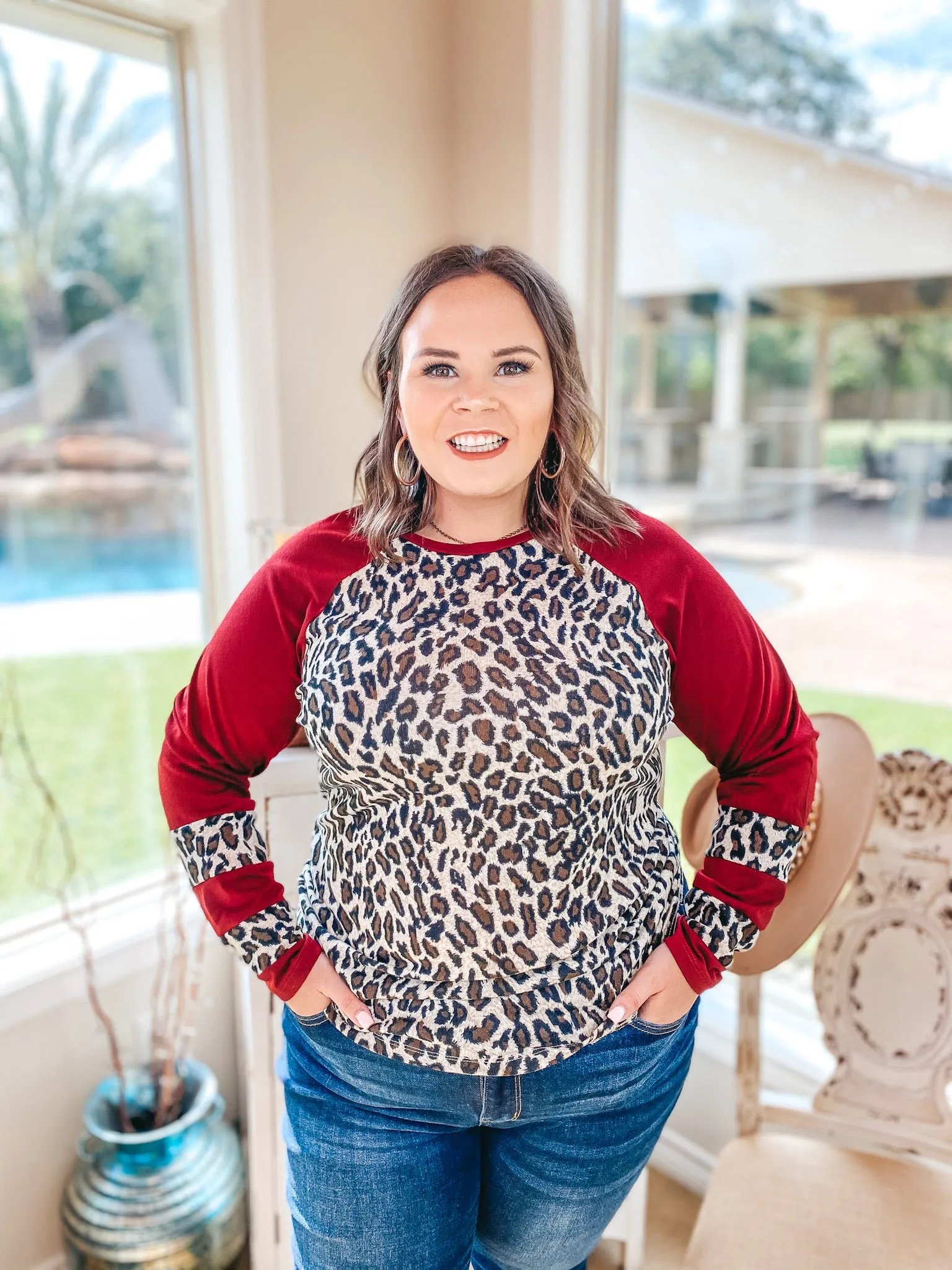 Last Chance Size 3XL | Earning Your Spots Leopard Long Sleeve Top with Color Block Sleeves in Maroon