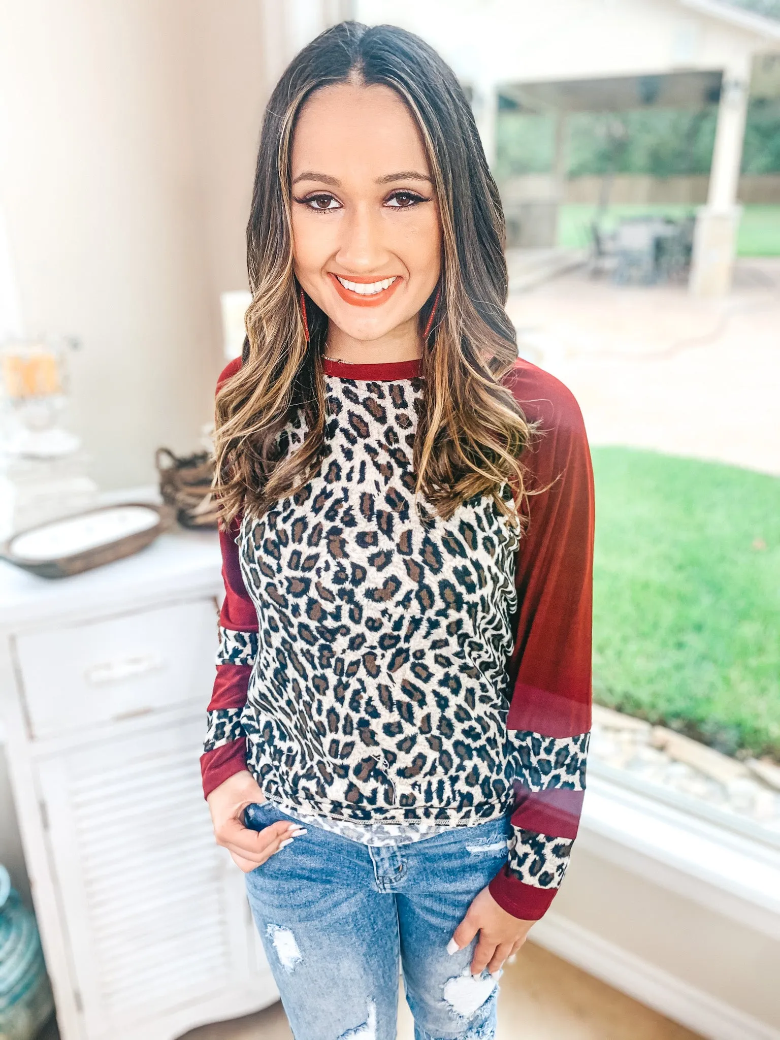 Last Chance Size 3XL | Earning Your Spots Leopard Long Sleeve Top with Color Block Sleeves in Maroon