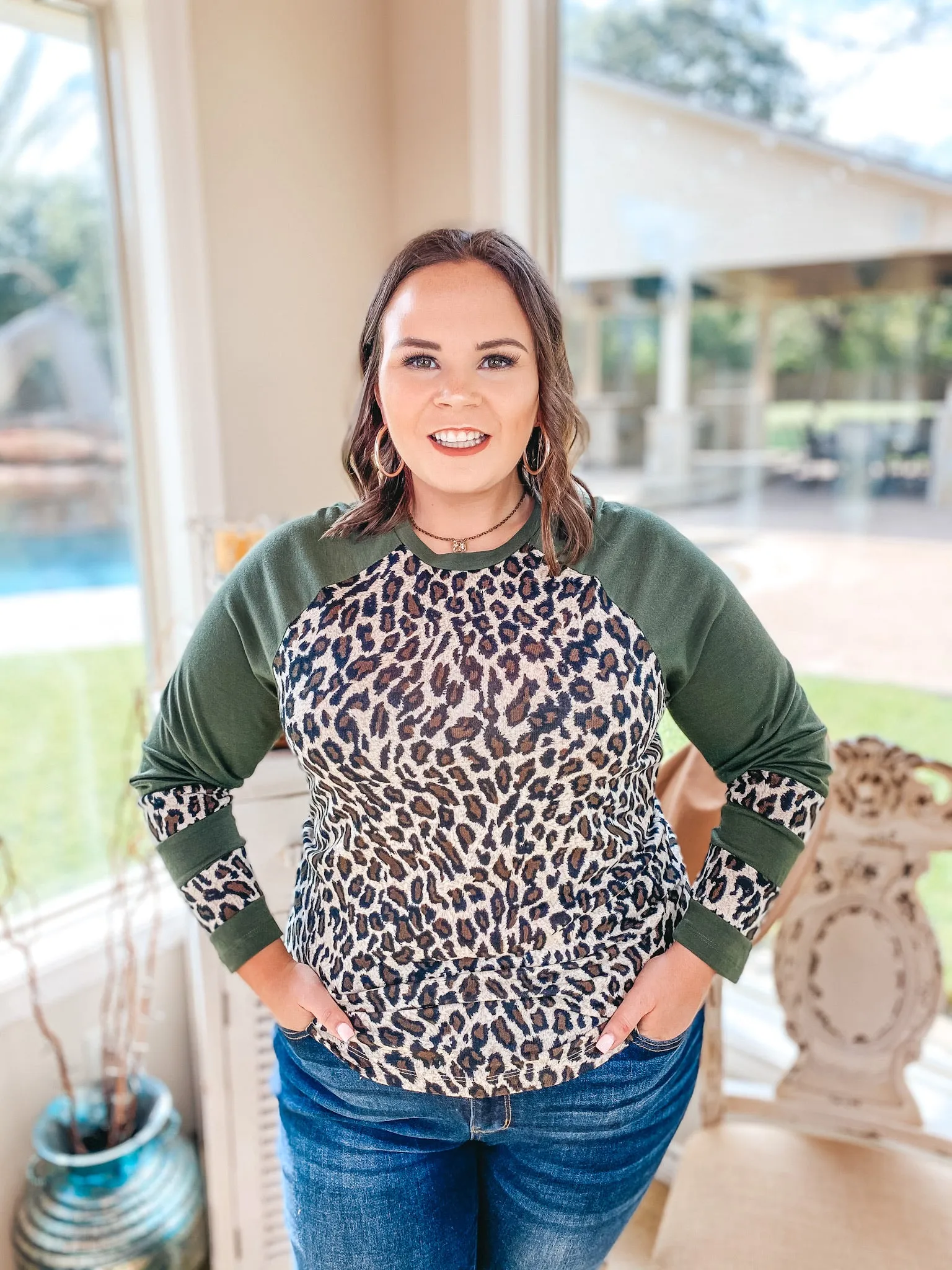 Last Chance Size 3XL | Earning Your Spots Leopard Long Sleeve Top with Color Block Sleeves in Olive Green