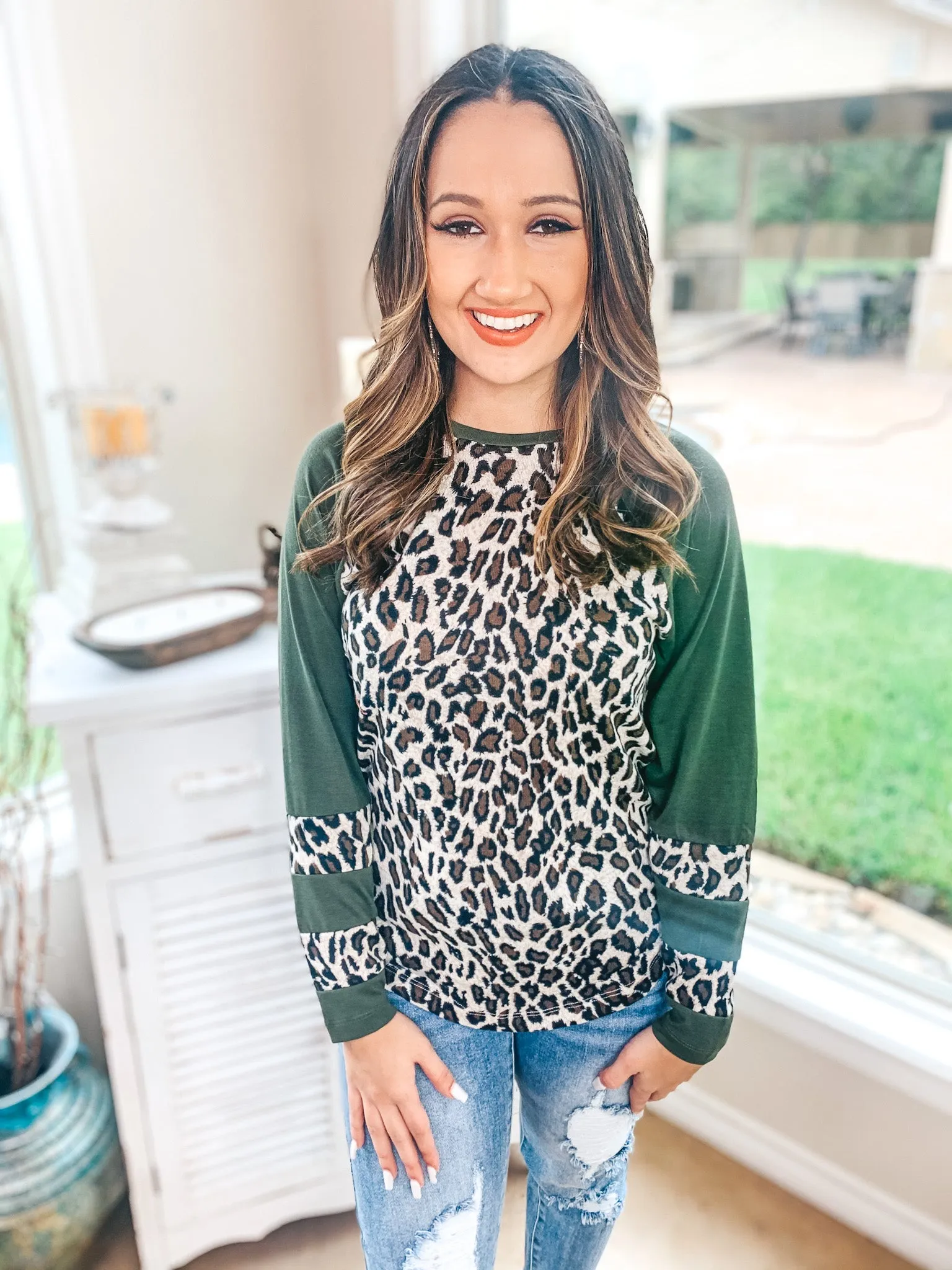 Last Chance Size 3XL | Earning Your Spots Leopard Long Sleeve Top with Color Block Sleeves in Olive Green