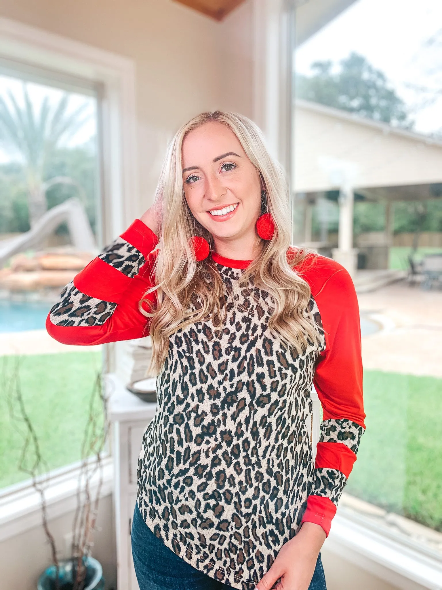 Last Chance Size Small & 3XL | Earning Your Spots Leopard Long Sleeve Top with Color Block Sleeves in Red