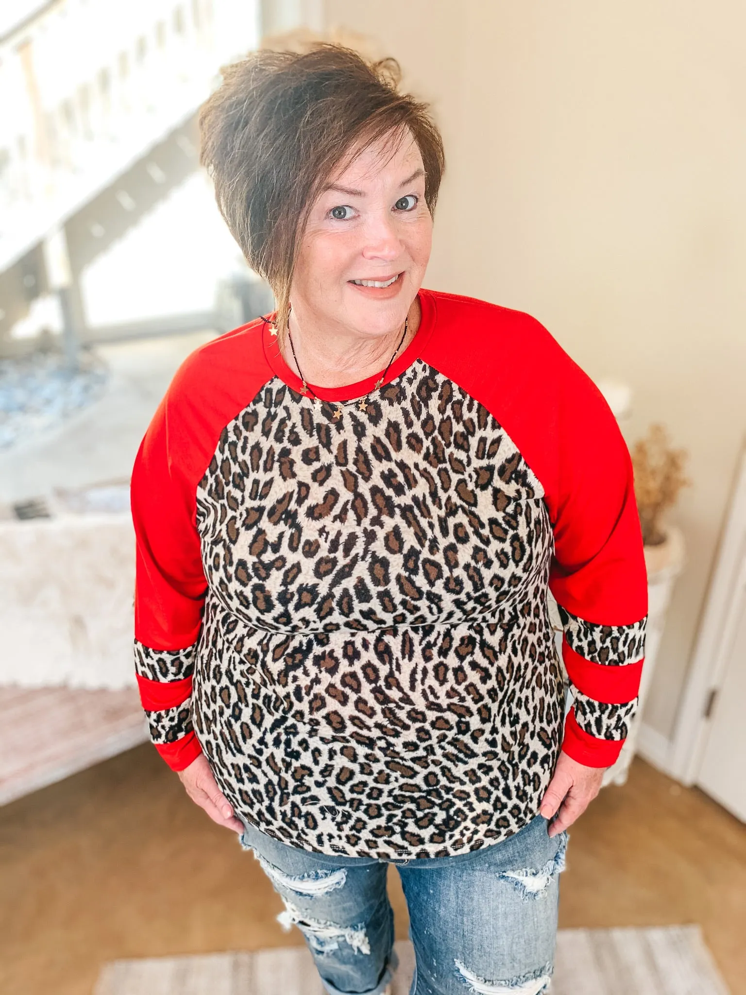 Last Chance Size Small & 3XL | Earning Your Spots Leopard Long Sleeve Top with Color Block Sleeves in Red